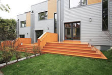Rear Yard with Drought Tolerant Landscaping and Rain Harvesting Barrel (Under Deck) - Photo Credit: Urbanica